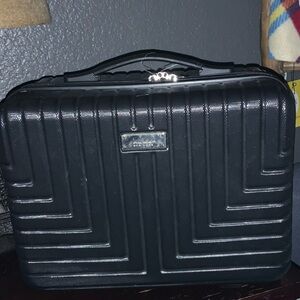 Nicole Miller miniature suitcase.